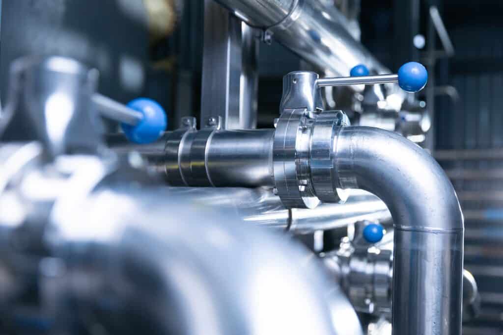 Stainless steel pipes. In critical settings, the ferroxyl test procedure is used to ensure purity.